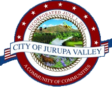 Seal of the City of Jurupa Valley with landscape, stars, and the text “A Community of Communities.”.
